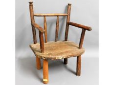 A rustic child's chair with elm seat, some worm 19