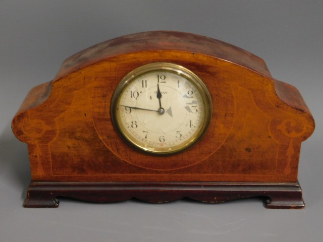 An early 20thC. French mantle clock, 12in wide x 6