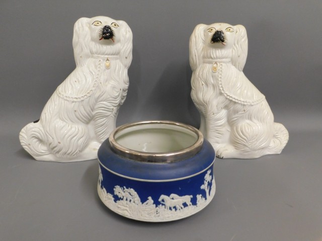 A pair of Victorian Staffordshire pottery dogs, 14
