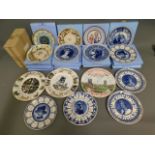 A quantity of boxed Wedgwood decorative plates inc