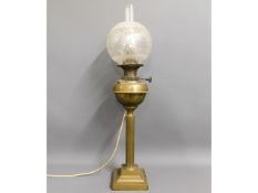 A Victorian brass oil lamp, later converted to ele