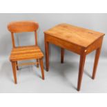 A teak child's school desk & chair