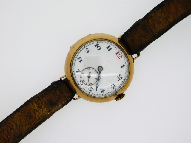 An early 20thC. gents 9ct gold case wrist watch, Swiss movement, case 30mm diameter, not running