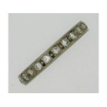 A white metal, electronically tests as platinum, eternity ring set with approx. 1.1ct diamond, 3.9g,