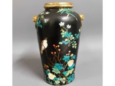 An Oriental vase with bird & flower decor, five ch