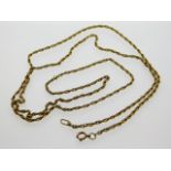 A 35in yellow metal rope chain, tests as 10ct gold