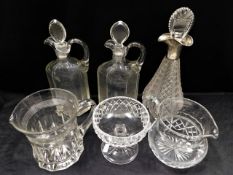 A silver collared decanter, bump to silver, a pair