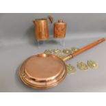 A 19thC. copper warming pan, a copper caddy & jug