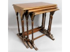 A mahogany nest of tables, 22in high