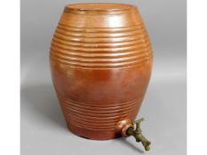 A salt glazed stoneware wine barrel with tap, 10.7