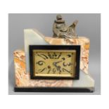 An art deco marble & onyx clock by E. Rigoulot, Re