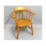 An antique elm smokers bow chair, 32in high