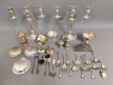 A pair of candelabra & a quantity of other metal &