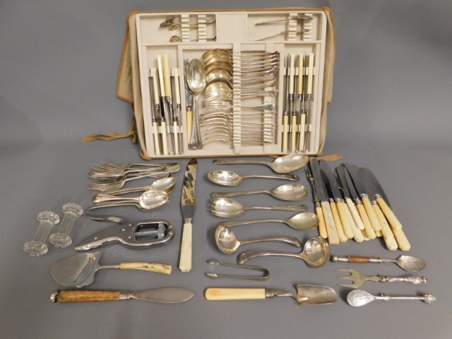 A quantity of mixed cutlery including a Stilton sc