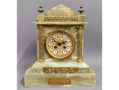 An Edwardian onyx clock "T. Kent & Son, Manchester