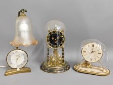 A Pifco Timeside lamp & clock twinned with two Kun