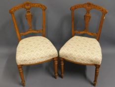 A pair of walnut Edwardian upholstered chairs, 33i