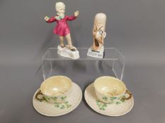 A pair of early 20thC. Belleek porcelain cups & sa