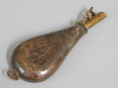 A 19thC. leather & brass powder flask, 9in long