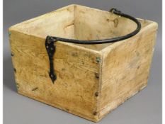 A rustic pine bucket with forged handle, 12.5in sq