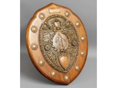 An oak mounted copper shield, "Best All Round Plat