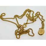 A 9ct gold chain, 20in long, with coffee bean pendant. 4.11g