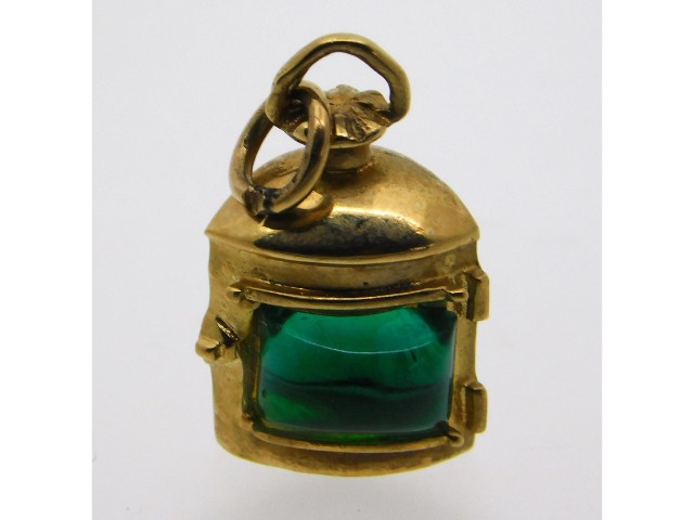 A 9ct gold charm in the form of a ships lantern, 2.61g