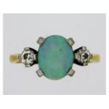 An 18ct gold opal ring set with 0.2ct diamonds, 3.54g, size L