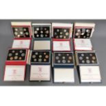 Eight Royal Mint proof coin sets