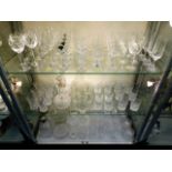 A quantity of drinking glasses & decanters includi
