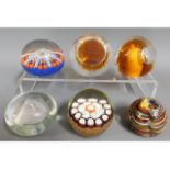 Six glass paperweights including millefiori