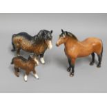 Two Beswick Shetland ponies twinned with a Doulton