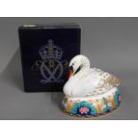 A Royal Crown Derby porcelain paperweight with box