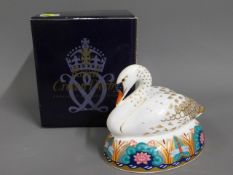 A Royal Crown Derby porcelain paperweight with box