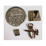 A Russian white metal brooch & three other Russian