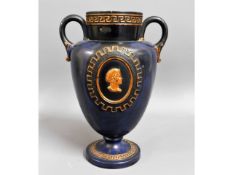 A Wedgwood style vase with relief decor, marked W
