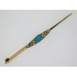 An antique two colour bar brooch set with diamond