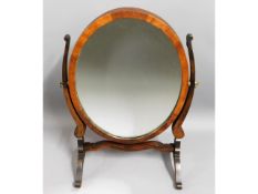 A 19thC. oval dressing table mirror, 21.5in high