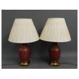 A modern pair of lamps with brass plinth, 25in hig