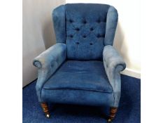 A 19thC. upholstered arm chair