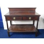 A mahogany two drawer wash stand with brass fittin