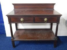 A mahogany two drawer wash stand with brass fittin