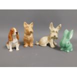 A Royal Doulton dog figure twinned with three Sylv