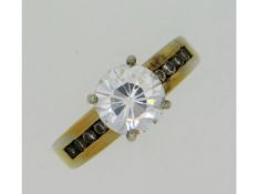 A gold plated silver ring set with CZ stones, size L, 4.7g