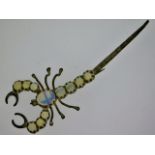 A costume brooch of scorpion with moonstone type s