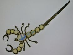 A costume brooch of scorpion with moonstone type s