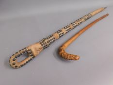 An ethnic tribal art cane 43.5in long twinned with