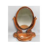 A Victorian dressing table mirror with trinket box