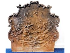 A 16/17thC. cast iron fireback depicting medieval