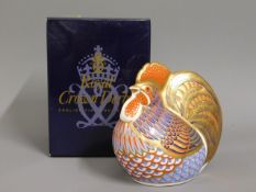 A Royal Crown Derby porcelain paperweight with box